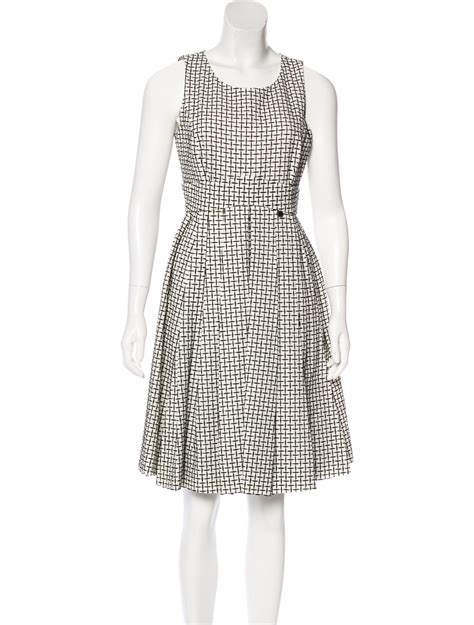 chanel white tweed dress|Chanel pleated dress.